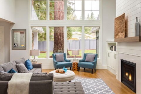 Beautiful interior of the house shining and lightened up by natural light coming from the windows